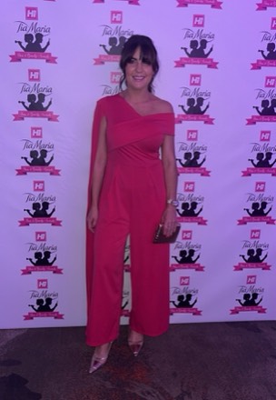 Louisa Murphy at the Tia Maria Hair & Beauty Awards photo wall.