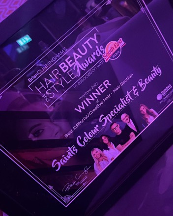 The framed certificate: Wexford 2022, winner of Best Editorial and Creative Hair, Saints Colour Specialist & Beauty.